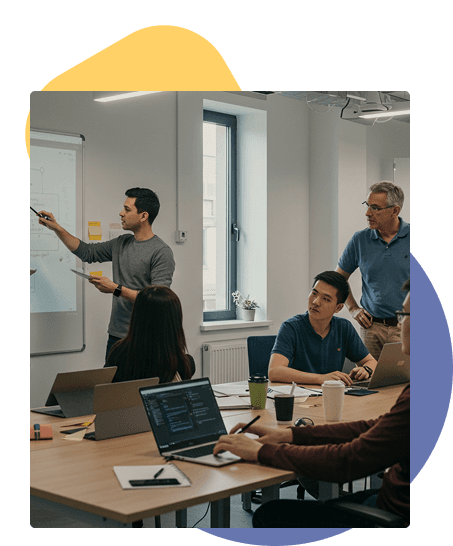 Team collaborating on whiteboard